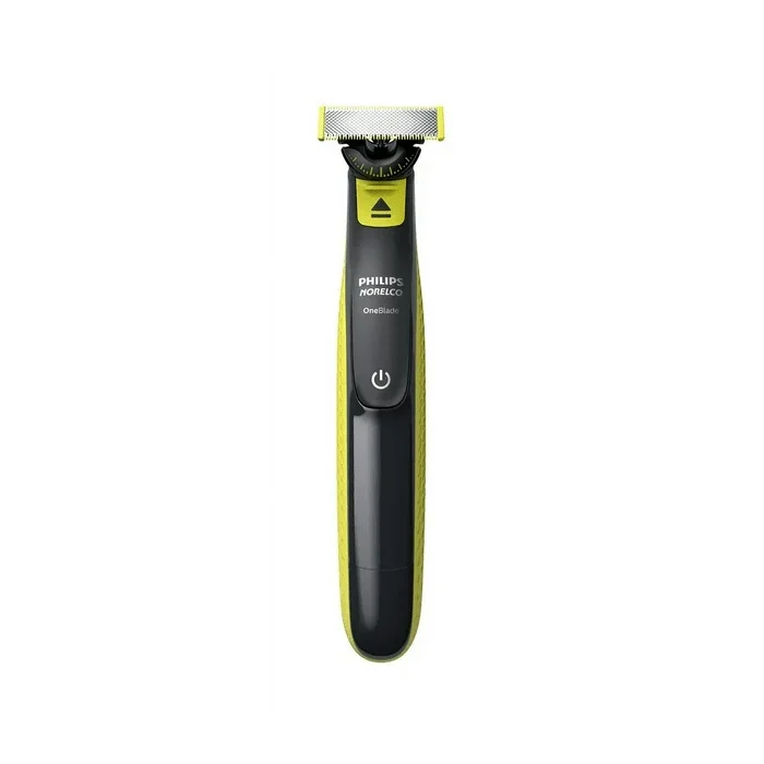 A black and yellow electric razor is on the floor.