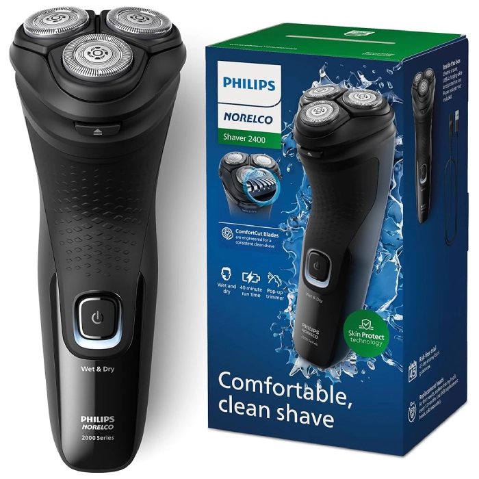 A black electric shaver next to its box.