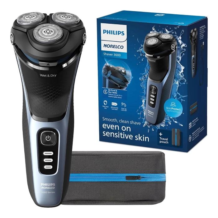 A philips norelco electric shaver with box and charger.