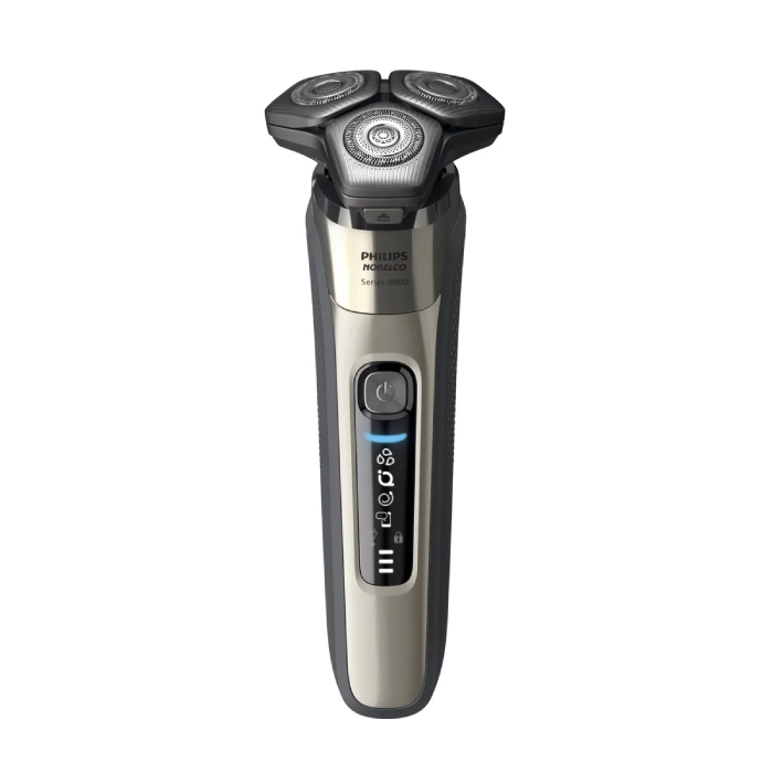 A silver and black electric razor with an lcd display.