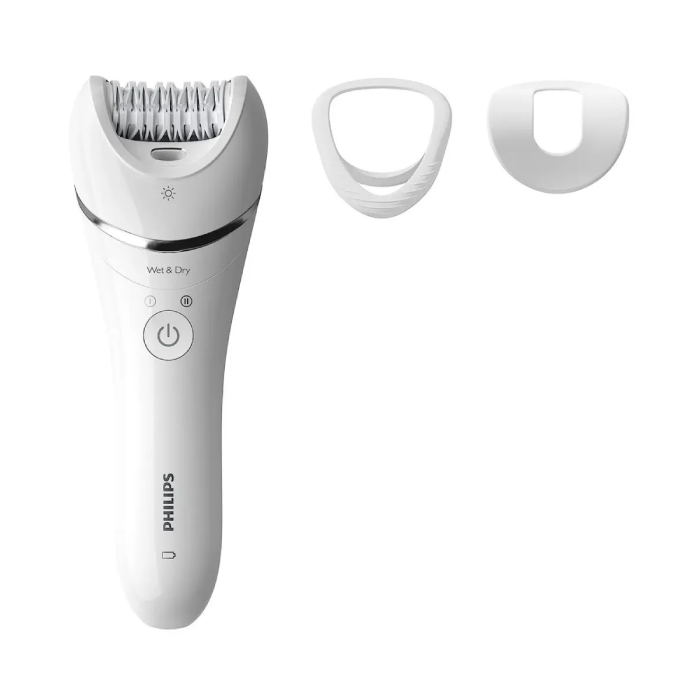 A white electric razor with three different blades.
