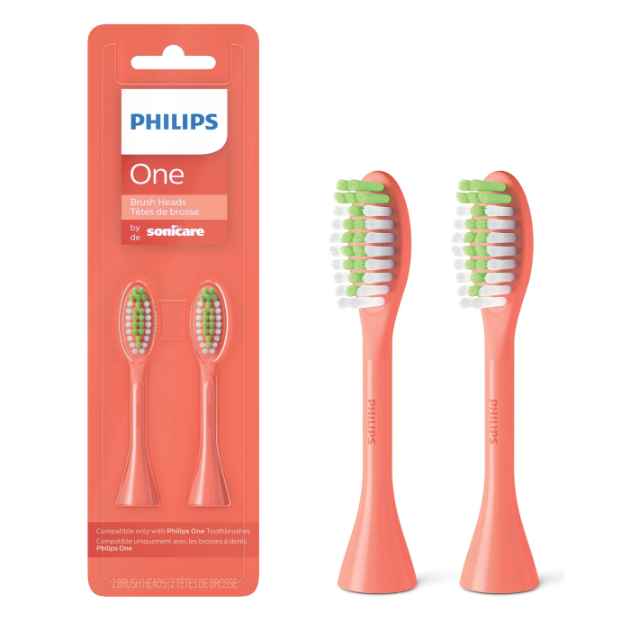 A pair of pink toothbrush heads in packaging.