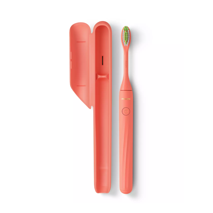 A pink toothbrush and case are shown.
