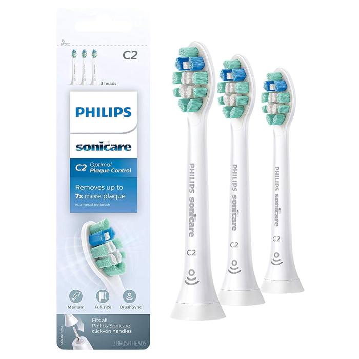 A package of three electric toothbrushes with different colors.