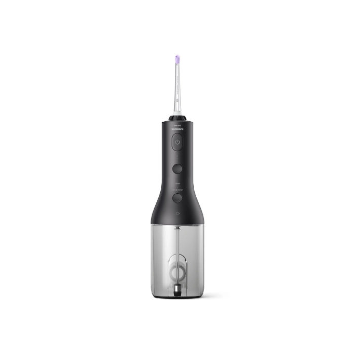 A black and silver electric toothbrush on top of white background.