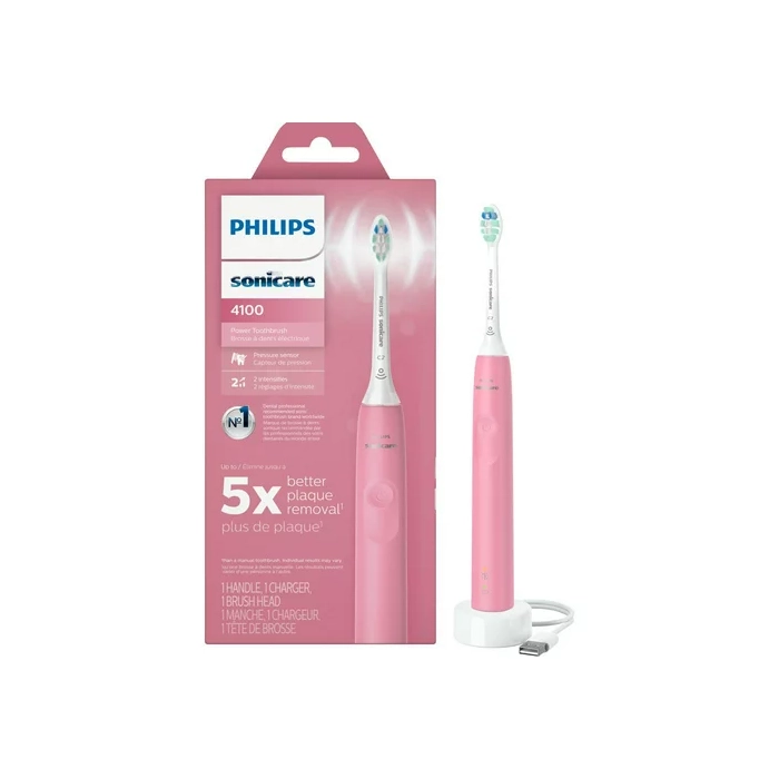 A pink toothbrush with its packaging open.