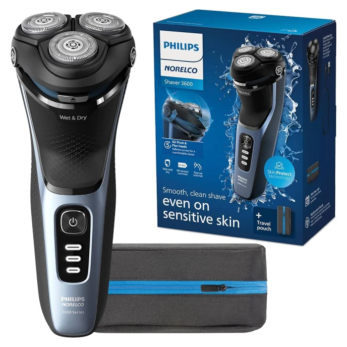 A philips norelco electric shaver with box and batteries.