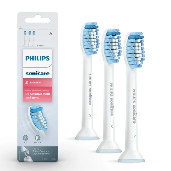A package of four philips sonicare electric toothbrush heads.