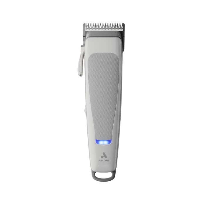 A white hair trimmer is sitting on the floor.