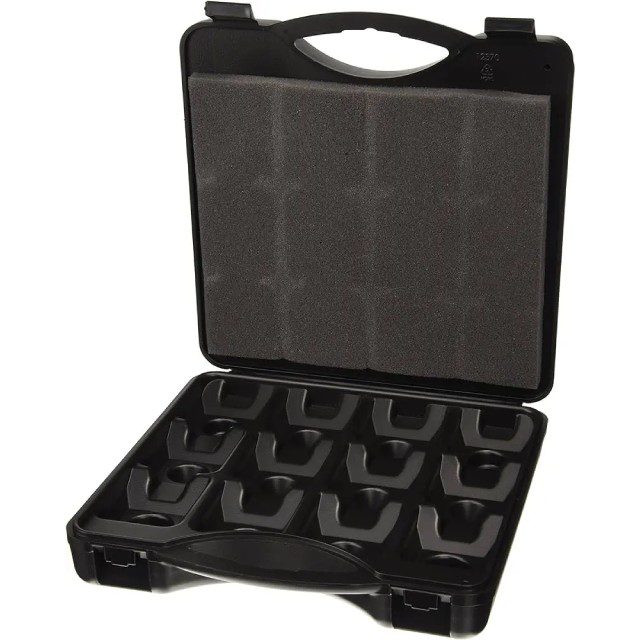 A black case with 1 2 pairs of shoes in it.