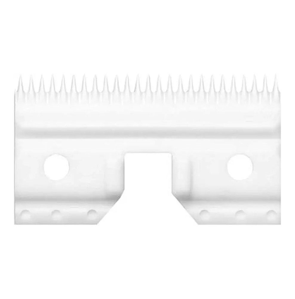 A white plastic comb attachment for a hair clipper.